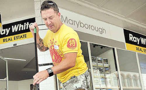 Guy Meredith cleans the footpath on the corner of Kent and Bazaar streets during Sunday’s town tidy up. Guy Meredith cleans the footpath on the corner of Kent and Bazaar streets during Sunday’s town tidy up.